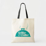 Grillin' & Chillin' Tote Bag<br><div class="desc">The Grillin' & Chillin' design is a great gift anyone who loves making food and is the ultimate home cook! Taste of Home is a cooking magazine & website with practical recipes from home cooks—not gourmet chefs featuring familiar everyday ingredientsand beautiful photos. More than recipes, Taste of Home fosters a...</div>