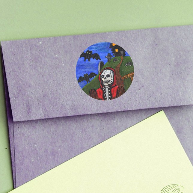 Grim Reaper Skeleton Bats Cemetery Classic Round Sticker (Skeleton in red hooded cape haunted house on hill bats tombstones on Halloween round stickers.)