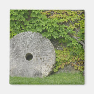 Grinding stone, Castle Banfi in Tuscany region, Magnet