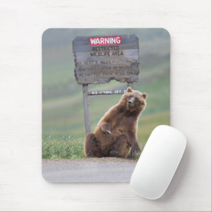 Grizzly Bear Plays With Sign Mouse Mat