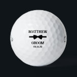 Groom Black Bow Tie Golf Balls<br><div class="desc">These golf balls are a great favour for the groom in your wedding. They feature a black bow tie with the groom's name above it in a modern CAP font and the word Groom along with the wedding date below. They'd be great for a bachelor party or weekend. The job...</div>