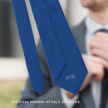 Groom Groomsmen Initials Blue Wedding Tie<br><div class="desc">Groom Groomsmen Initials Mid Blue Wedding. Hidden on the back you can easily personalise the initials so there can be no mistaking who's tie belongs to who! The colour and font of the initials and also the tie colour can be changed if you so wish to match your own wedding...</div>