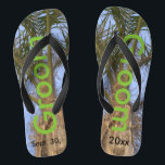 Groom Palm Trees Blue Sky Flip Flops<br><div class="desc">Cool Palm Trees with a Pretty Blue Sky in the background Unisex Flip Flops with Groom written in a nice green colour text, and Date of Marriage in black text. PERSONALIZE with your Wedding DATE (or delete text). Feel the ocean breeze and tropics beneath your feet. Shown with Wide Black...</div>