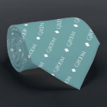 Groom - Repeating White Text on Teal Tie<br><div class="desc">This fun neck tie is the perfect accessory for the groom at your wedding. It features a simple yet elegant design with the word "Groom" written in a decorative all capital white font, and repeating in a diagonal pattern with diamond separators on a teal or turquoise coloured background. Perfect for...</div>