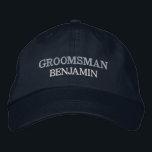 Groomsman Bachelor Party Wedding Role Custom Embroidered Hat<br><div class="desc">Add a name and the role to play at the wedding by clicking the "Personalised" button. This chic and stylish cap serves as the perfect memento of a memorable getaway with your favourite buddies. The front of the cap showcases a captivating sports-inspired "Groom" typography that perfectly captures the fun and...</div>