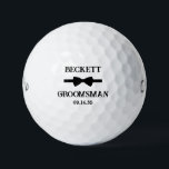 Groomsman Black Bow Tie Golf Balls<br><div class="desc">These golf balls are a great favour for the groomsman in your wedding. They feature a black bow tie with the groomsman's name above it in a modern CAP font and the word Groomsman along with the wedding date below. They'd be great for a bachelor party or weekend. The job...</div>