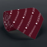 Groomsman Repeating White Text on Burgundy Tie<br><div class="desc">This fun neck tie is the perfect accessory for the groomsmen at your wedding. It features a simple yet elegant design with the word "groomsman" written in fancy all capital white text repeating in a diagonal pattern on a burgundy or maroon background. Perfect way to add a bit of class...</div>