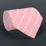 Groomsman Repeating White Text on Pink Tie<br><div class="desc">This fun neck tie is the perfect accessory for the groomsmen at your wedding. It features a simple yet elegant design with the word "groomsman" written in fancy all capital white text repeating in a diagonal pattern on a blush rose or pink coloured background. Perfect way to add a bit...</div>