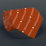 Groomsman Repeating White Text on Rust Orange Tie<br><div class="desc">This fun neck tie is the perfect accessory for the groomsmen at your wedding. It features a simple yet elegant design with the word "groomsman" written in fancy all capital white text repeating in a diagonal pattern on a rust orange or burnt umber coloured background. Perfect way to add a...</div>