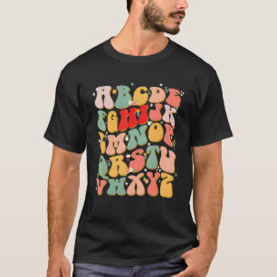 Groovy Alphabet Say Happy First Day Of School Teac T-Shirt