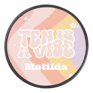 groovy rainbow ten is a vibe 60's retro daisy cool hockey puck