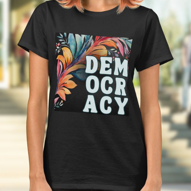 Groovy Retro Colourful Statement Democracy T-Shirt (A t-shirt with 'Democracy' in capital letters in a retro groovy style, on a colorful leafy backdrop)