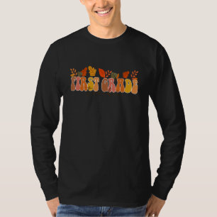 Groovy Retro First Grade Teacher Vintage Fall Leav T-Shirt