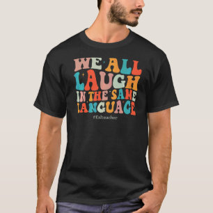 Groovy We All Laugh In The Same Language ESL Teach T-Shirt