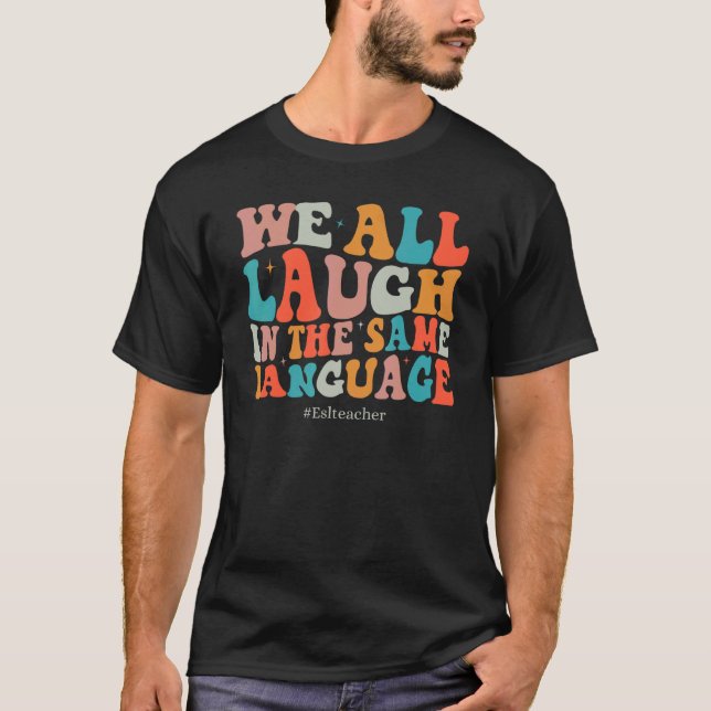 Groovy We All Laugh In The Same Language ESL Teach T-Shirt (Front)