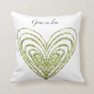 Grow in love  accent pillow with green hearts.