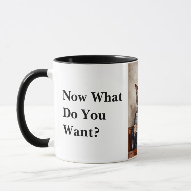 Grumpy Office Cat Reading the Newspaper Mug (Left)