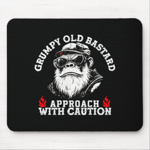 Grumpy old approach with caution monkey on back mouse mat