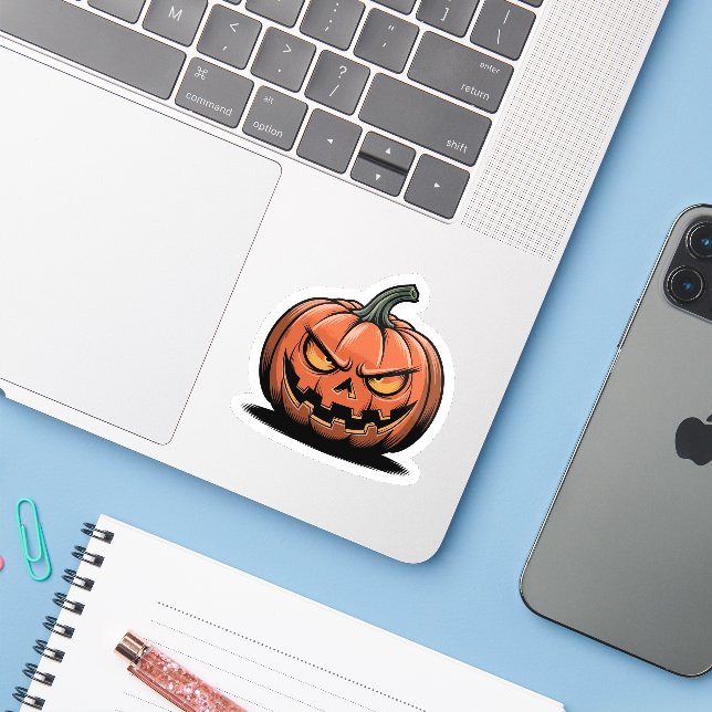 Grumpy Pumpkin Sticker – Halloween Mood (Laptop w/ iPhone)
