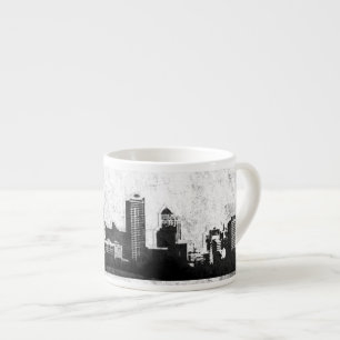 Grungy city background in black and white espresso cup