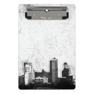 Grungy city background in black and white mini clipboard