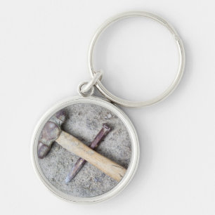 Grungy hammer and chisel key ring