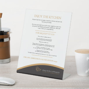 Guest kitchen black gold property rental business  pedestal sign