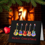 Guitar Merry Christmas Funny Psychedelic Music Holiday Card<br><div class="desc">Christmas guitars wearing santa hats illustration folded holiday card. Guitar Christmas Funny Psychedelic Festive Music Greetings card. Acoustic guitars, electric guitars and semi accurate guitars in psychedelic colourful designs each with a funny Santa hat. This funny festive card is customisable and a great way to spread some Christmas cheer with...</div>