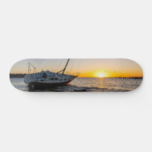Gulf Breeze Sailboat And Jetty Sunset Skateboard