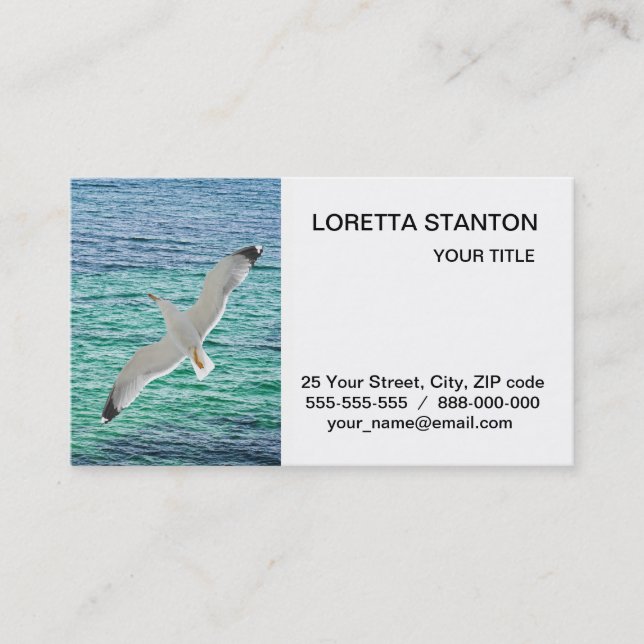 Gull flying above a sea business card (Front)