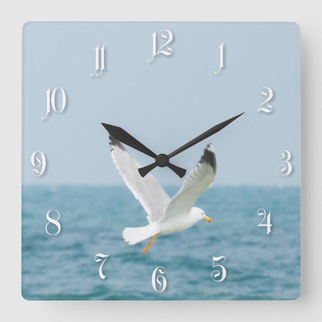 Gull flying above sea square wall clock (Front)