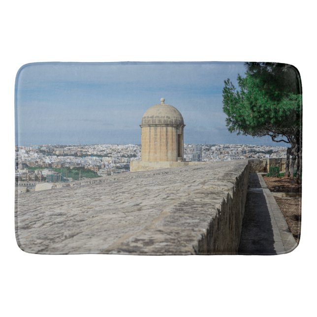 Gun turret on old city walls in Valletta, Malta Bath Mat (Front)