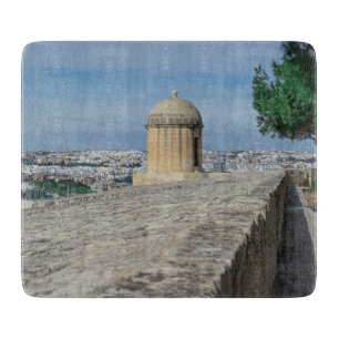 Gun turret on old city walls in Valletta, Malta Cutting Board
