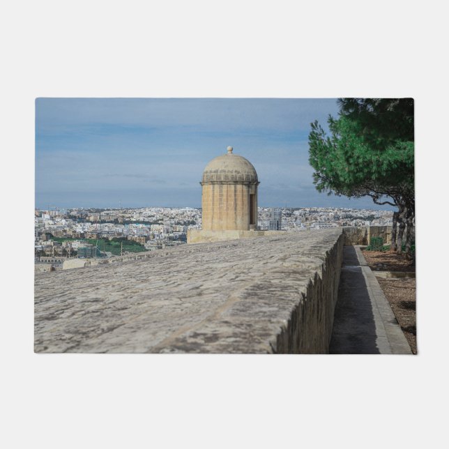 Gun turret on old city walls in Valletta, Malta Doormat (Front)