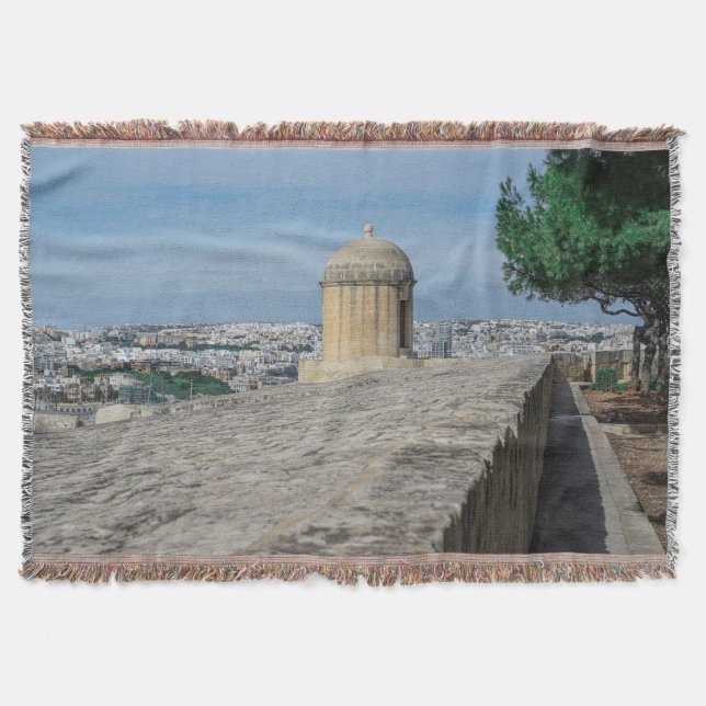 Gun turret on old city walls in Valletta, Malta Throw Blanket (Front)