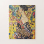 Gustav Klimt Lady With Fan Art Nouveau Painting Jigsaw Puzzle<br><div class="desc">Gustav Klimt Lady With Fan Art Nouveau Painting This half portrait of a beautiful woman shows a yellow background with asiatic ornaments, colourful birds and lotus flowers. The lady wears a dress in the style of a kimono imprinted with motives of a Chinese dragon dress. Beautiful artistic romantic decorative fine...</div>