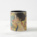 Gustav Klimt Lady With Fan Art Nouveau Painting Mug<br><div class="desc">Gustav Klimt Lady With Fan Art Nouveau Painting This half portrait of a beautiful woman shows a yellow background with asiatic ornaments, colourful birds and lotus flowers. The lady wears a dress in the style of a kimono imprinted with motives of a Chinese dragon dress. Beautiful artistic romantic decorative fine...</div>