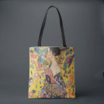 Gustav Klimt Lady With Fan Art Nouveau Painting Tote Bag<br><div class="desc">Gustav Klimt Lady With Fan Art Nouveau Painting This half portrait of a beautiful woman shows a yellow background with asiatic ornaments, colourful birds and lotus flowers. The lady wears a dress in the style of a kimono imprinted with motives of a Chinese dragon dress. Beautiful artistic romantic decorative fine...</div>