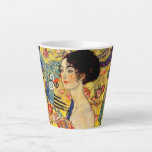 Gustav Klimt Lady with Fan Latte Mug<br><div class="desc">Latte Mug featuring Gustav Klimt’s oil painting Lady with Fan (1918). A woman wearing a blue kimono holds a red fan against a colourful yellow background of flowers and peacocks. A great gift for fans of Japonisme and European art.</div>
