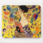 Gustav Klimt Lady with Fan Mouse Mat<br><div class="desc">Mouse Pad featuring Gustav Klimt’s oil painting Lady with Fan (1918). A woman wearing a blue kimono holds a red fan against a colourful yellow background of flowers and peacocks. A great gift for fans of Japonisme and European art.</div>