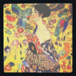 Gustav Klimt Lady with Fan Stone Coaster<br><div class="desc">Stone Coaster featuring Gustav Klimt’s oil painting Lady with Fan (1918). A woman wearing a blue kimono holds a red fan against a colourful yellow background of flowers and peacocks. A great gift for fans of Japonisme and European art.</div>