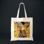 Gustav Klimt Lady with Fan Tote Bag<br><div class="desc">Tote Bag featuring Gustav Klimt’s oil painting Lady with Fan (1918). A woman wearing a blue kimono holds a red fan against a colourful yellow background of flowers and peacocks. A great gift for fans of Japonisme and European art.</div>