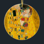 Gustav Klimt The Kiss Ceramic Tree Decoration<br><div class="desc">Ornament featuring Gustav Klimt’s oil painting with gold leaf The Kiss (1908). A man and woman,  wearing brilliant golden colours,  lovingly embrace and kiss in a field of flowers. A great gift for fans of Art Nouveau and Austrian art.</div>