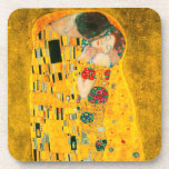 Gustav Klimt The Kiss Coaster<br><div class="desc">Coasters featuring Gustav Klimt’s oil painting with gold leaf The Kiss (1908). A man and woman,  wearing brilliant golden colours,  lovingly embrace and kiss in a field of flowers. A great gift for fans of Art Nouveau and Austrian art.</div>