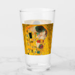 Gustav Klimt The Kiss Glass<br><div class="desc">Coffee Mug featuring Gustav Klimt’s oil painting with gold leaf The Kiss (1908). A man and woman,  wearing brilliant golden colours,  lovingly embrace and kiss in a field of flowers. A great gift for fans of Art Nouveau and Austrian art.</div>