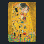 Gustav Klimt The Kiss iPad Pro Cover<br><div class="desc">iPad Cover featuring Gustav Klimt’s oil painting with gold leaf The Kiss (1908). A man and woman,  wearing brilliant golden colours,  lovingly embrace and kiss in a field of flowers. A great gift for fans of Art Nouveau and Austrian art.</div>