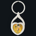 Gustav Klimt The Kiss Key Ring<br><div class="desc">Keychain featuring Gustav Klimt’s oil painting with gold leaf The Kiss (1908). A man and woman,  wearing brilliant golden colours,  lovingly embrace and kiss in a field of flowers. A great gift for fans of Art Nouveau and Austrian art.</div>