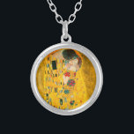 Gustav Klimt The Kiss Silver Plated Necklace<br><div class="desc">Necklace featuring Gustav Klimt’s oil painting with gold leaf The Kiss (1908). A man and woman,  wearing brilliant golden colours,  lovingly embrace and kiss in a field of flowers. A great gift for fans of Art Nouveau and Austrian art.</div>