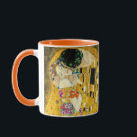 Gustav Klimt - The Kiss / Valentine's Day Mug<br><div class="desc">The Kiss (in German Der Kuss) is an oil-on-canvas painting with added gold leaf, silver and platinum by the Austrian symbolist painter Gustav Klimt. The painting depicts a couple embracing each other, their bodies entwined in elaborate beautiful robes decorated in a style influenced by the contemporary Art Nouveau style and...</div>