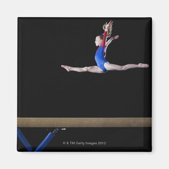 Gymnast (9-10) leaping on balance beam 2 magnet (Front)